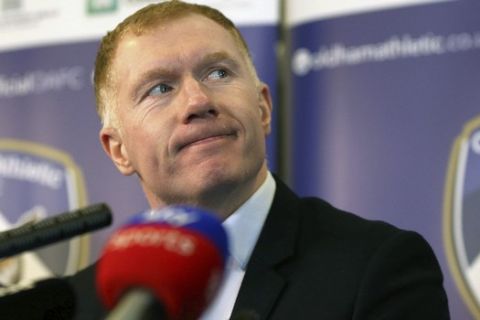 Newly unveiled Oldham Athletic soccer club manager Paul Scholes during a press conference at Boundary Park in Oldham, England, Monday Feb. 11, 2019. Former Manchester United midfielder Paul Scholes has landed his first managerial job at Oldham, which plays in England's fourth division.(Barrington Coombs/PA via AP)