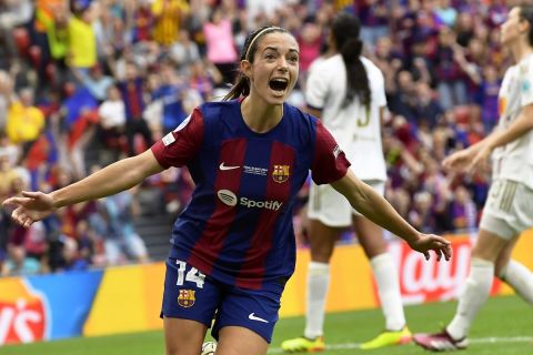 Barcelona's Aitana Bonmati celebrates after scoring the opening goal during the women's Champions League final soccer match between FC Barcelona and Olympique Lyonnais at the San Mames stadium in Bilbao, Spain, Saturday, May 25, 2024. (AP Photo/Alvaro Barrientos)