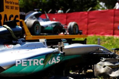 MONTMELO, SPAIN - MAY 15: The car of Lewis Hamilton of Great Britain and Mercedes GP at the side of the track, behind is the car of Nico Rosberg of Germany and Mercedes GP after they crashed together during the Spanish Formula One Grand Prix at Circuit de Catalunya on May 15, 2016 in Montmelo, Spain.  (Photo by Clive Mason/Getty Images)