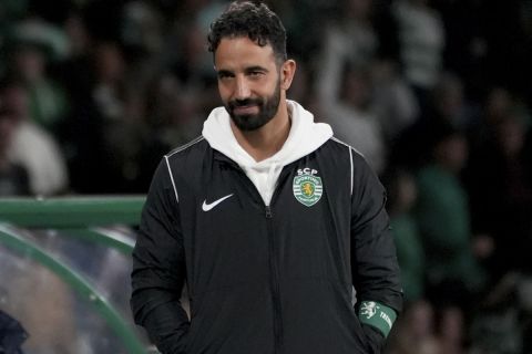 Sporting's head coach Ruben Amorim, who Manchester United has expressed an interest in hiring, stands by the touchline during a Portuguese League Cup soccer match between Sporting CP and Nacional at the Alvalade stadium in Lisbon, Tuesday, Oct. 29, 2024. (AP Photo/Ana Brigida)