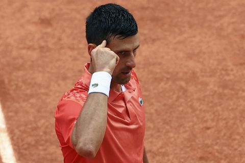 Serbia's Novak Djokovic reacts during his final match of the French Open tennis tournament against Norway's Casper Ruud at the Roland Garros stadium in Paris, Sunday, June 11, 2023. (AP Photo/Aurelien Morissard)