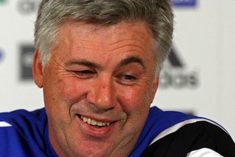 Chelsea manager Carlo Ancelotti considers a question during a press conference at their training ground, Cobham, England, Friday Nov. 27, 2009. Chelsea will play Arsenal in a Premier League match on Sunday.(AP Photo/Tom Hevezi) ** NO INTERNET/MOBILE USAGE WITHOUT FOOTBALL ASSOCIATION PREMIER LEAGUE(FAPL)LICENCE. CALL +44 (0) 20 7864 9121 or EMAIL info@football-dataco.com FOR DETAILS **