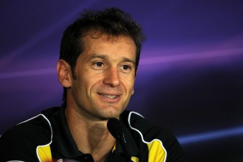 Team Lotus' Italian driver Jarno Trulli  speaks during a press conference at the Autodromo Nazionale circuit on September 8, 2011 in Monza ahead of the Formula One Italian Grand Prix. AFP PHOTO / DIMITAR DILKOFF (Photo credit should read DIMITAR DILKOFF/AFP/Getty Images)