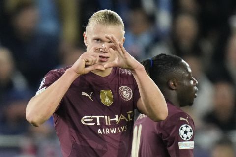 Manchester City's Erling Haaland celebrates after scoring his side's third goal during the Champions League opening phase soccer match between Slovan Bratislava and Manchester City in Bratislava, Slovakia, Tuesday, Oct. 1, 2024. (AP Photo/Petr Josek)