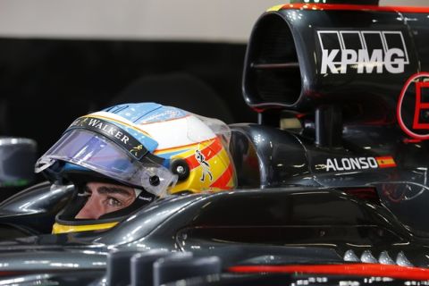 Fernando Alonso in the garage.