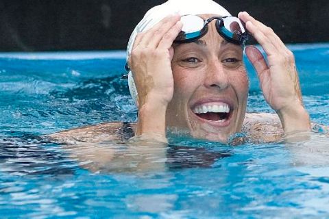 Olympic medalist Janet Evans, 39, smiles during a swim at the Janet Evans Swim Complex before the Janet Evans Invitational, a Masters meet, Saturday, June 11, 2011, in Fullerton, Calif. This will be her first competitive swim since the 1996 Atlanta Olympics, after training for six months in hopes of earning a spot on the U.S. team for the London Games. (AP Photo/Orange County Register, Mindy Schauer)   MAGS OUT; LOS ANGELES TIMES OUT