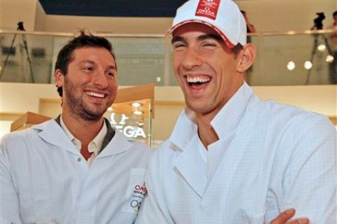 Swimming stars Ian Thorpe from Australia and  Michael Phelps addresses the audience from the stage of the OMEGA Pavilion on the Olympic Green in Beijing, Wednesday, Aug. 20, 2008. (AP Photo/Photopress, Alexandra Wey)