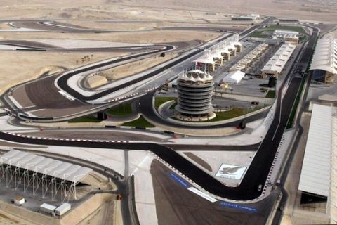 An aerial view shows the Formula One Grand Prix circuit in Manama in this April 1, 2004 file photo. Formula One's season-opening Bahrain Grand Prix next month may have to be cancelled due to bloodshed in the capital Manama, the sport's commercial supremo Bernie Ecclestone told Reuters on Thursday.  REUTERS/Stringer/Files  (BAHRAIN - Tags: SPORT MOTOR RACING POLITICS CIVIL UNREST)