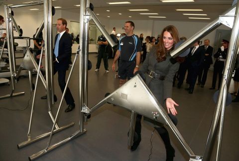 BURTON-UPON-TRENT, ENGLAND - OCTOBER 09:  Prince William, Duke of Cambridge and Catherine, Duchess of Cambridge play a reaction game in the new gym during the official launch of The Football Association's National Football Centre at St George's Park on October 9, 2012 in Burton-upon-Trent, England.  (Photo by Chris Jackson - Pool /The FA via Getty Images)