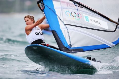 WEYMOUTH, ENGLAND - AUGUST 01:  Gelly Skarlatou of Greece competes in the RS:X Women's Sailing on Day 5 of the London 2012 Olympic Games at the Weymouth & Portland Venue at Weymouth Harbour on August 1, 2012 in Weymouth, England.  (Photo by Clive Mason/Getty Images)