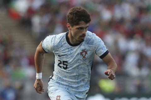 Portugal's Pedro Neto controls the ball during an international friendly soccer match between Portugal and Croatia at the National Stadium in Oeiras, outside Lisbon, Saturday, June 8, 2024. (AP Photo/Pedro Rocha)