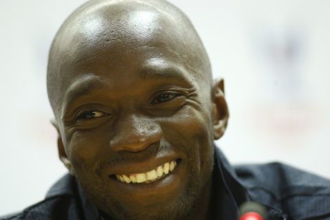 FILE - This is a Friday, July 31, 2009  file photo of Paris Saint-Germain's player Claude Makelele  reacts as he talks to the media during a press conference at the Emirates Stadium in London . English Premier League side Swansea City confirmed Wednesday Jan. 11, 2017  that former French international Claude Makelele has joined the clubs coaching staff.( AP Photo/Sang Tan, File)