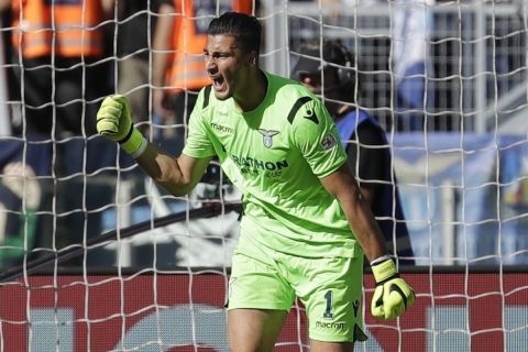 Lazio goalkeeper Thomas Strakosha reacts after a save on Roma's Alessandro Florenzi during the Serie A soccer match between Roma and Lazio, at the Rome Olympic Stadium, Saturday, Sept. 29, 2018. (AP Photo/Andrew Medichini)