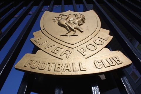 LIVERPOOL, ENGLAND - OCTOBER 12:  The Liverpool Football Club emblem, the Liver Bird, adorns the  gates of Anfield on October 12, 2010 in Liverpool, England. The Royal Bank of Scotland, which holds the majority of Liverpool's debts, is seeking a high court order to prevent the American co-owners, Tom Hicks and George Gillett Jr, from removing the chairman Martin Broughton and another board member.  (Photo by Christopher Furlong/Getty Images)