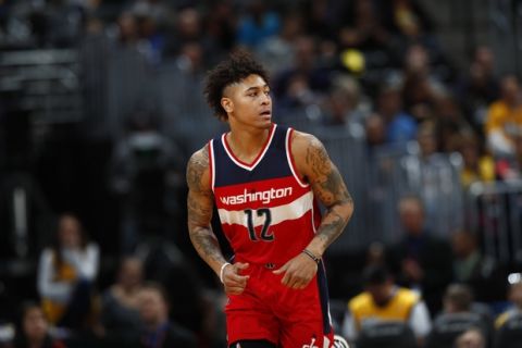 Washington Wizards forward Kelly Oubre Jr. (12) in the second half of an NBA basketball game Wednesday, March 8, 2017, in Denver. The Wizards won 123-113. (AP Photo/David Zalubowski)