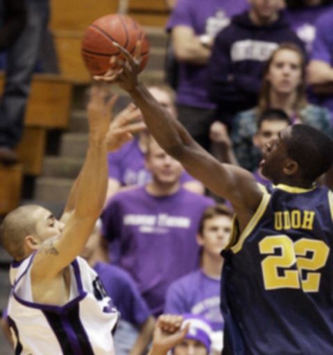 Above, Michigan's Ekpe Udoh (22) blocks a shot by North-western's Michael Thompson. Udoh had 14 points and 11 rebounds.

Left, U-M's Manny Harris drives to the basket. Harris scored 22 points.
photos: Nam Y. Huh, ap