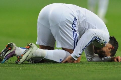 MADRID, SPAIN - MARCH 03:  Cristiano Ronaldo of Real Madrid reacts during the la Liga match between Real Madrid and Malaga at Estadio Santiago Bernabeu on March 3, 2011 in Madrid, Spain. Ronaldo abandoned the match injured.  (Photo by Jasper Juinen/Getty Images)