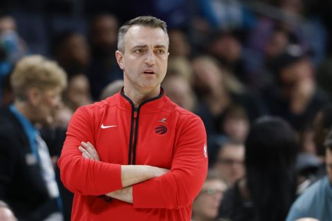 Toronto Raptors head coach Darko Rajakovic watches his team during the first half of an NBA basketball game against the Charlotte Hornets in Charlotte, N.C., Wednesday, Feb. 7, 2024. (AP Photo/Nell Redmond)