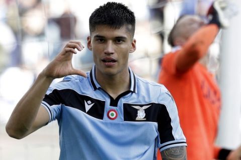 Lazio's Joaquin Correa celebrates after scoring his side's second goal during an Italian Serie A Soccer match between Lazio and Bologna at Rome's Olympic stadium, Saturday, Feb. 29, 2020. (AP Photo/Andrew Medichini)