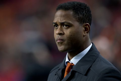 Assistant coach Patrick Kluivert of The Netherlands watches players ahead of the Group D world cup qualifying soccer match Netherlands against Estonia at ArenA stadium in Amsterdam, Netherlands, Friday March 22, 2013. (AP Photo/Peter Dejong)