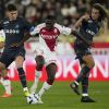 Marseille's Leonardo Balerdi, left, and Matteo Guendouzi, right, challenge for the ball with Monaco's Youssouf Fofana during the French League One soccer match between Monaco and Marseille at the Stade Louis II in Monaco, Sunday, Nov. 13, 2022. (AP Photo/Daniel Cole)