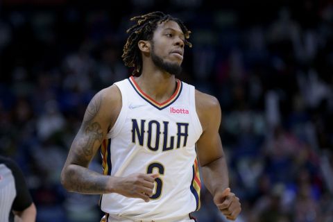 New Orleans Pelicans guard Tyrone Wallace (6) runs in the second half of an NBA basketball game against the Houston Rockets in New Orleans, Sunday, March 13, 2022. (AP Photo/Matthew Hinton)