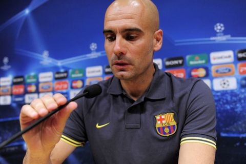 Barcelona's coach Josep Guardiola gives a press conference at the Camp Nou stadium in Barcelona on April 23, 2012, on the eve of the UEFA Champions League semi-final second leg football match Barcelona vs Chelsea.   AFP PHOTO / JOSEP LAGO (Photo credit should read JOSEP LAGO/AFP/Getty Images)