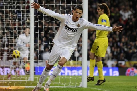 Real Madrid's Portuguese forward Cristiano Ronaldo reacts after scoring during the Spanish league football match Real Madrid CF vs Villarreal CF on January 9, 2011 at Santiago Bernabeu stadium in Madrid.    AFP PHOTO/ DOMINIQUE FAGET (Photo credit should read DOMINIQUE FAGET/AFP/Getty Images)