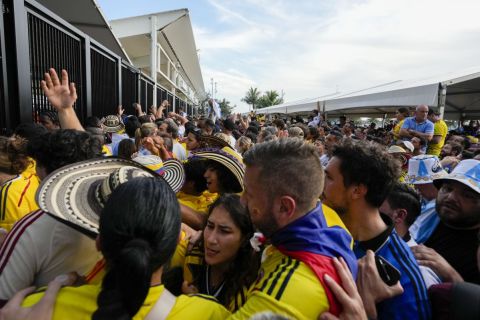 Fans wait to enter the stadium prior to the Copa America final soccer match between Argentina and Colombia in Miami Gardens, Fla., Sunday, July 14, 2024. (AP Photo/Lynne Sladky)