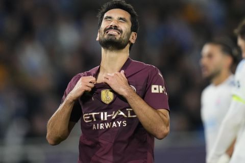 Manchester City's Ilkay Gundogan reacts after missing a chance during the Champions League opening phase soccer match between Slovan Bratislava and Manchester City in Bratislava, Slovakia, Tuesday, Oct. 1, 2024. (AP Photo/Petr David Josek)