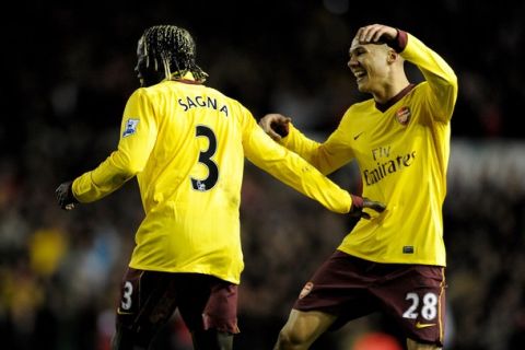 LEEDS, ENGLAND - JANUARY 19:  Bacary Sagna of Arsenal celebrates scoring his team's second goal with team mate Keiran Gibbs during the FA Cup sponsored by E.On Third Round Replay match between Leeds United and Arsenal at Elland Road on January 19, 2011 in Leeds, England.  (Photo by Michael Regan/Getty Images)