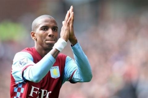 Aston Villa's Ashley Young gestures to fans during his teams English Premier League soccer match against Liverpool at Villa Park stadium, Birmingham, England, Sunday, May 22, 2011. (AP Photo/Simon Dawson) NO INTERNET/MOBILE USAGE WITHOUT FOOTBALL ASSOCIATION PREMIER LEAGUE (FAPL) LICENCE. CALL +44 (0) 20 7864 9121 or EMAIL info@football-datco.com FOR DETAILS 