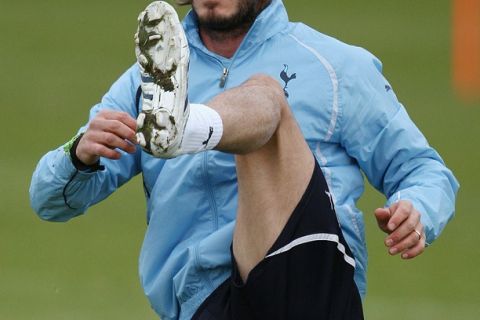 English footballer David Beckham trains for the first time with Tottenham Hotspur at their Spurs Lodge training complex in Chigwell, east of London, on January 11, 2011. Harry Redknapp held his first training session with David Beckham but it is still unclear whether the former England captain will be granted permission to play for Tottenham over the next few weeks. The Los Angeles Galaxy midfielder was given the green light to start training with the Tottenham squad yesterday after completing a series of fitness tests at the club's training ground in Chigwell, Essex. AFP PHOTO/Paul Childs/POOL

FOR EDITORIAL USE ONLY Additional licence required for any commercial/promotional use or use on TV or internet (except identical online version of newspaper) of Premier League/Football League photos. Tel DataCo +44 207 2981656. Do not alter/modify photo (Photo credit should read Paul Childs/AFP/Getty Images)