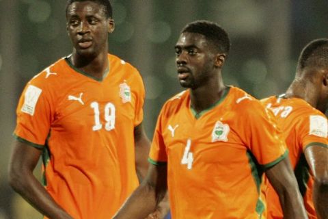 KUMASI, GHANA - FEBRUARY 7:  Yaya Toure and brother Kolo Toure of the Ivory Coast look dejected during the AFCON semi-final match between Ivory Coast and Egypt held at the Baba Yara Stadium on February 7, 2008 in Kumasi, Ghana. (Photo by Lefty Shivambu/Gallo Images/Getty Images)