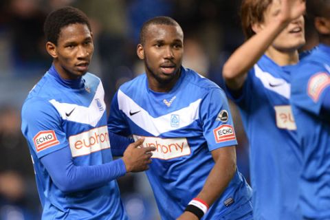 20121125 - GENK, BELGIUM: Genk's Glynor Plet and Genk's Khaleem Hyland celebrate during the Jupiler Pro League match between RC Genk and OH Leuven, in Genk, Sunday 25 November 2012, on day 17 of the Belgian soccer championship. BELGA PHOTO YORICK JANSENS