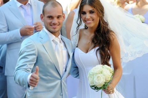 Inter-Milan's Dutch football player Wesley Sneijder (L) and Dutch model Yolanthe Cabau van Kasbergen pose outside the Church of San Giusto e Clemente in Castelnuovo Berardegna near Siena on July 17, 2010 after their wedding which took place in the Tuscan village. AFP PHOTO/ Tiziana Fabi (Photo credit should read TIZIANA FABI/AFP/Getty Images)(Photo Credit should Read /AFP/Getty Images)