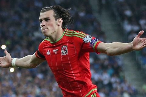 Football - Israel v Wales - UEFA Euro 2016 Qualifying Group B - Haifa International Stadium, Haifa, Israel - 28/3/15
 Gareth Bale celebrates after scoring the second goal for Wales
 Action Images via Reuters / Matthew Childs
 Livepic
 EDITORIAL USE ONLY.