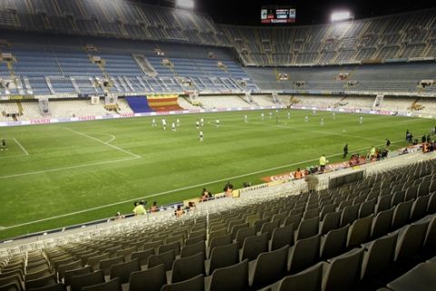 A view of the empty Mestalla stadium during the continuation of a Copa del Rey quarterfinal, second leg soccer match, between Valencia and Deportivo Coruna, at Mestalla stadium in Valencia, Spain, Wednesday, Feb. 1, 2006. The match was suspended a week earlier after 43 minutes when a linesman was hit by a coin and Valencia was sanctioned  to play the match without supporters due to this incident. (AP Photo/ Fernando Bustamante)