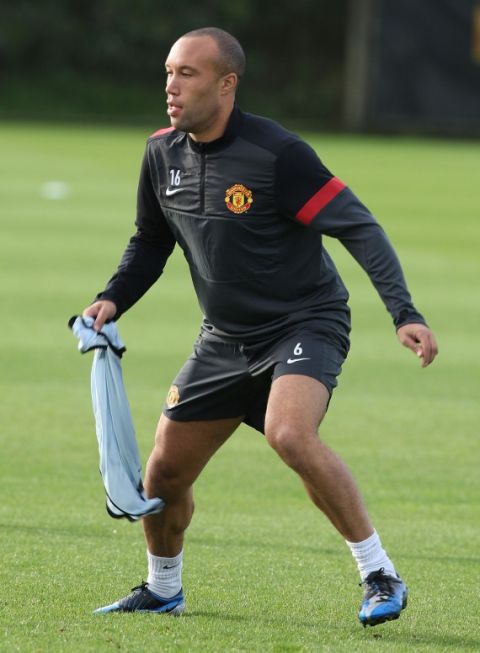 MANCHESTER, ENGLAND - OCTOBER 01:  Former player Mikael Silvestre of Manchester United in action during a first team training session, ahead of their UEFA Champions League match against Cluj, at Carrington Training Ground on October 1, 2012 in Manchester, England.  (Photo by Matthew Peters/Man Utd via Getty Images)