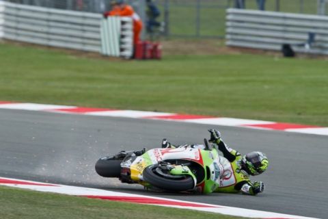 NORTHAMPTON, ENGLAND - JUNE 10:  Loris Capirossi of Italy and Pramac Racing Team crashed out during the free practice of MotoGP of Great Britain at Silverstone Circuit on June 10, 2011 in Northampton, England.  (Photo by Mirco Lazzari gp/Getty Images)