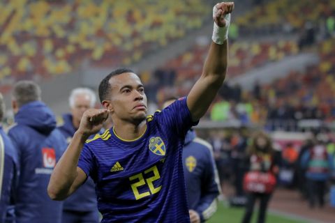 Sweden's Robin Quaison celebrates after the Euro 2020 group F qualifying soccer match between Romania and Sweden on the National Arena stadium in Bucharest, Romania, Friday, Nov. 15, 2019. (AP Photo/Vadim Ghirda)