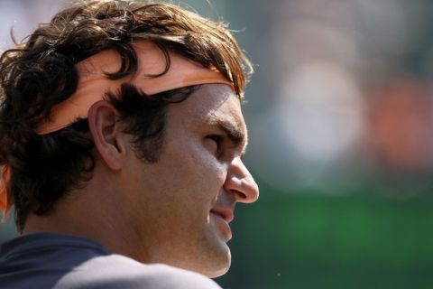 KEY BISCAYNE, FL - MARCH 31:  Roger Federer of Switzerland looks on against Gilles Simon of France of during the Sony Ericsson Open at Crandon Park Tennis Center on March 31, 2011 in Key Biscayne, Florida.  (Photo by Al Bello/Getty Images)