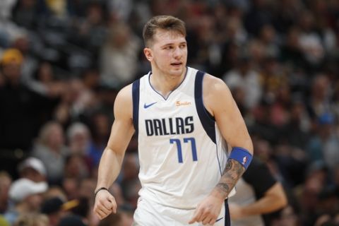 Dallas Mavericks forward Luka Doncic (77) in the second half of an NBA basketball game Tuesday, Dec. 18, 2018, in Denver. The Nuggets won 126-118. (AP Photo/David Zalubowski)