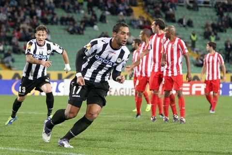 Mehdi Benatia of Udinese celebrates with his teammates after scoring a goal during the UEFA Europa League, Group I third match between Udinese and Atletico de Madrid, at the Friuli Stadium in Udine, on October 20, 2011.  AFP PHOTO / ANTEPRIMA (Photo credit should read Anteprima/AFP/Getty Images)