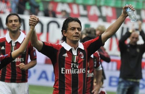 AC Milan's Filippo Inzaghi greets supporters at the end of the Serie A soccer match against Novara at the San Siro stadium in Milan May 13, 2012.  REUTERS/Paolo Bona (ITALY - Tags: SPORT SOCCER)