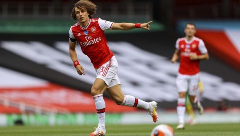 Arsenal's David Luiz during the English Premier League soccer match between Arsenal and Norwich City at the Emirates Stadium in London, England, Wednesday, July 1, 2020. (Richard Heathcote/Pool via AP)