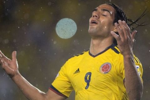 Colombian forward Radamel Falcao reacts after missing a shot against Ecuador during their Brazil 2014 FIFA World Cup South American qualifier match, in Barranquilla, Colombia, on September 6, 2013. AFP PHOTO / EITAN ABRAMOVICH
