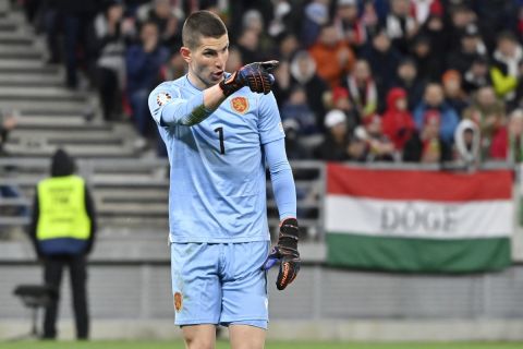 Bulgaria's goalkeeper Daniel Naumov gestures during the Euro 2024 group G qualifying soccer match between Hungary and Bulgaria at the Puskas Arena stadium in Budapest, Hungary, Monday, March 27, 2023. (AP Photo/Denes Erdos)