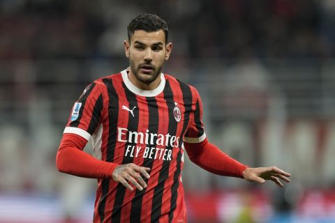 AC Milan's Theo Hernandez runs during the Serie A soccer match between AC Milan and Lecce at the San Siro stadium, in Milan, Italy, Friday, Sept. 27, 2024. (AP Photo/Antonio Calanni)