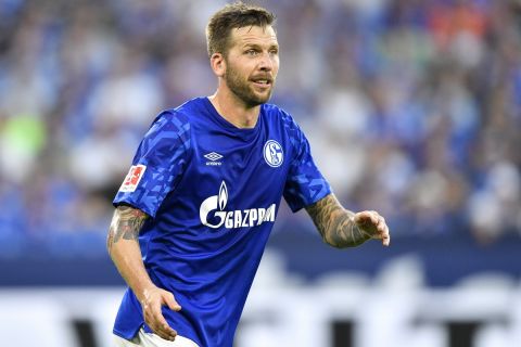 Schalke's Guido Burgstaller runs during the German Bundesliga soccer match between FC Schalke 04 and Bayern Munich in Gelsenkirchen, Germany, Saturday, Aug. 24, 2019. (AP Photo/Martin Meissner)